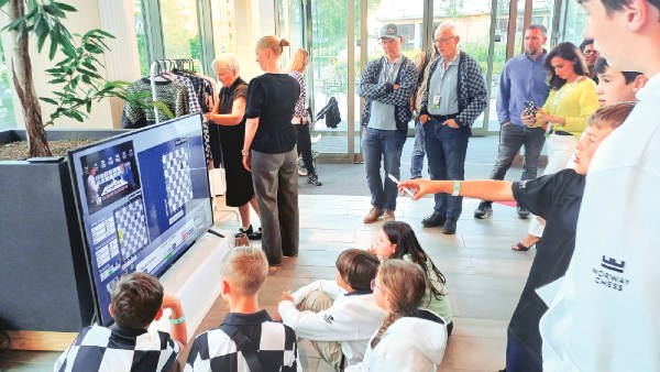 How Norway shaped Magnus Carlsen Eye News | WN24 2 Kids watching: Children watching Magnus on TV. (Credit: Amit Kamath)