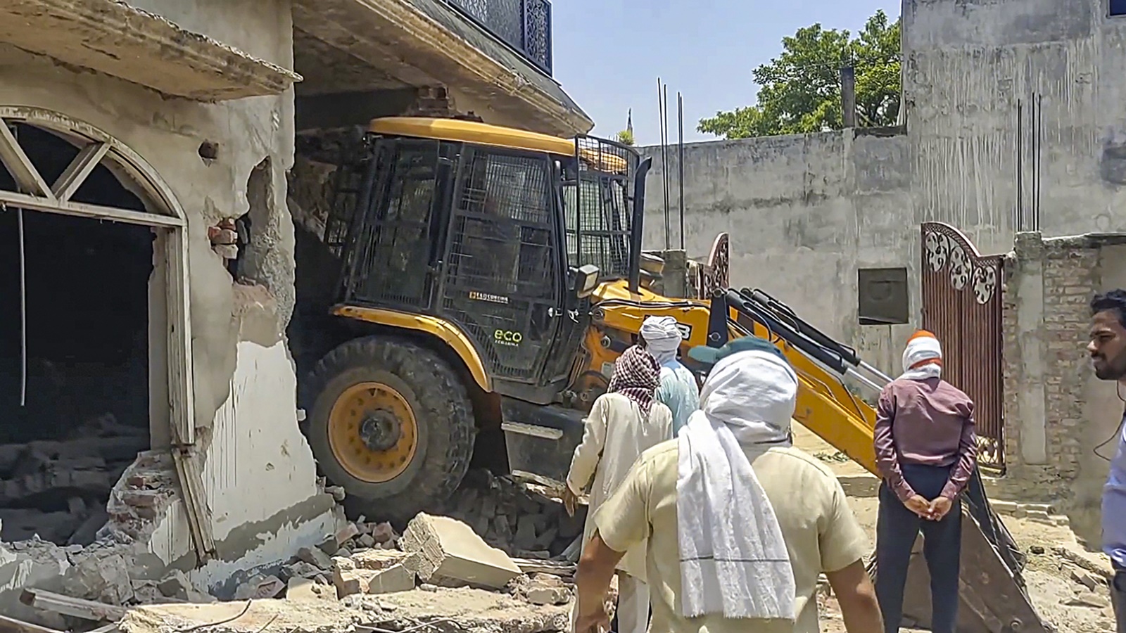 Bulldozers demolish 6 properties in UP as authorities act against ...