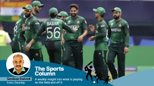 Pakistan's Haris Rauf, center without cap, celebrates with teammates the dismissal of India's Jasprit Bumrah during the ICC Men's T20 World Cup cricket match between India and Pakistan at the Nassau County International Cricket Stadium in Westbury, New York