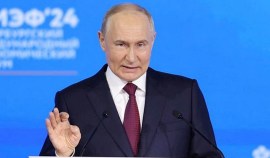 Russian President Vladimir Putin delivers a speech at a plenary session of the St. Petersburg International Economic Forum (SPIEF) in Saint Petersburg, Russia.