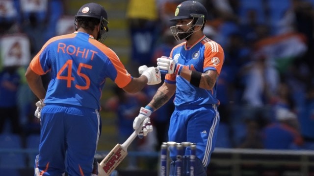 T20 World Cup 2024 Match Today: India's captain Rohit Sharma, left, and Virat Kohli celebrate scoring runs during the ICC Men's T20 World Cup cricket match between India and Bangladesh at Sir Vivian Richards Stadium in North Sound, Antigua and Barbuda.