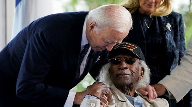 U.S President Joe Biden and first lady Jill Biden meet a World War II veteran on the day of a ceremony to mark the 80th anniversary of the 1944 D-Day landings at the Normandy American Cemetery and Memorial in Colleville-sur-Mer, France, June 6, 2024.
