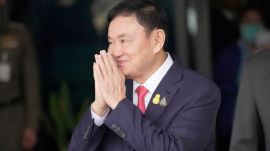 Thailand PM jail term reduced Thaksin