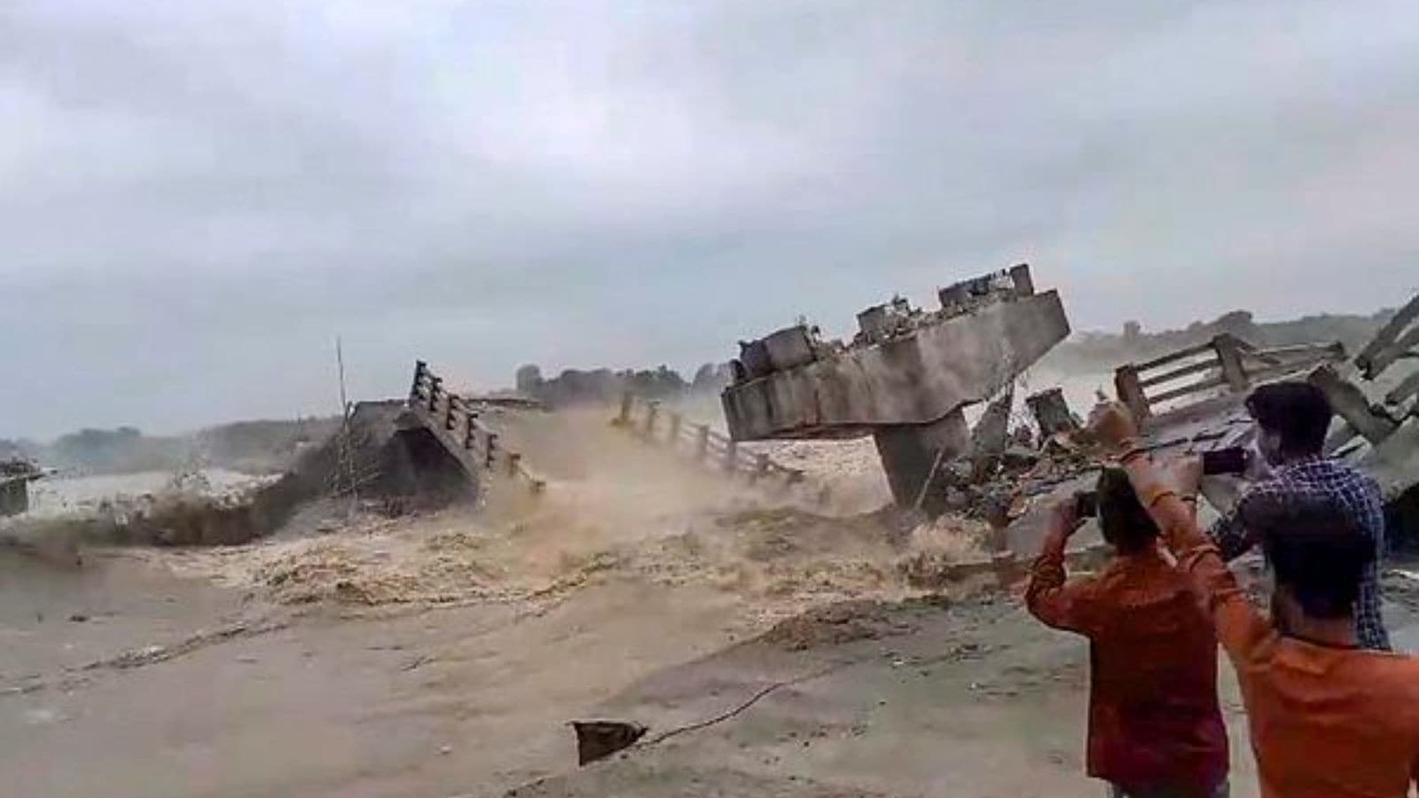 A bridge collapses into the Bakra river at Padkiya Ghat, in the Sikti block area of Araria, Bihar