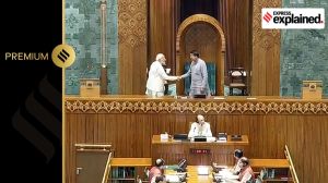 Prime Minister Narendra Modi shakes hands with Speaker pro-tem B Mahtab after taking oath as a member of the House during the first day of the first session of the newly-constituted 18th Lok Sabha, in New Delhi, Monday, June 24, 2024.