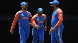 T20 World Cup 2024 Match Today: India's Virat Kohli, left, speaks to captain Rohit Sharma, right, during the ICC Men's T20 World Cup cricket match between Afghanistan and India at Kensington Oval in Bridgetown, Barbados. (AP)