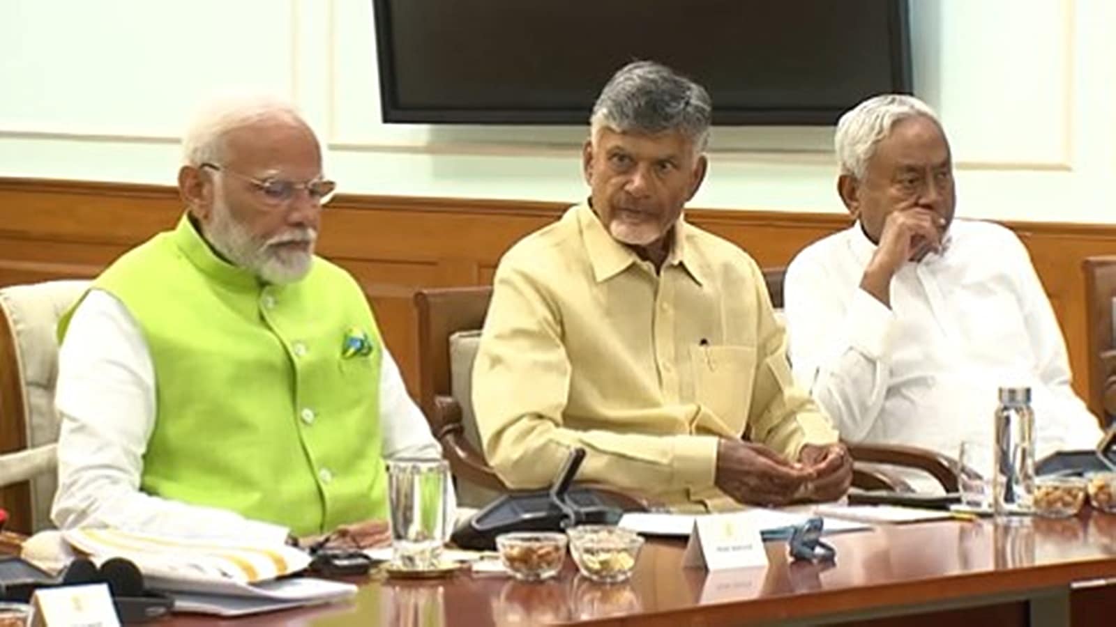 Election Results 2024 Prime Minister Narendra Modi, TDP supremo N Chandrababu Naidu and JD(U) chief Nitish Kumar at the NDA meeting on Wednesday.  (Video screengrab/ ANI)