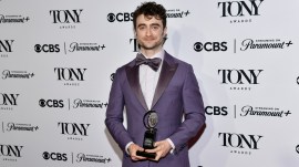 Daniel Radcliffe poses with his Tony award