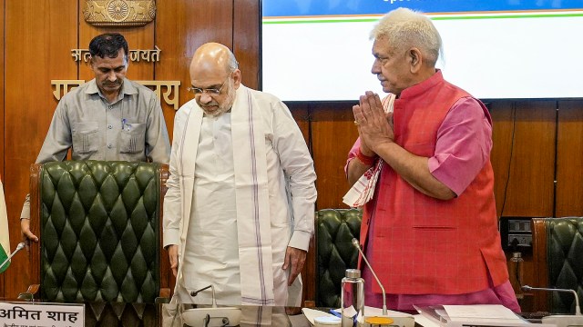 Union Home Minister Amit Shah with Lieutenant Governor of J&K Manoj Sinha at the high-level meet to to review the security situation in Jammu and Kashmir. (PTI)