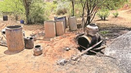 bootlegging racket busted, Gurgaon police, Gurgaon cops drone, bootlegging racket in Aravallis, Gurgaon Aravalli hills, Guragaon police drone strategy, raw liquor seized, indian express news