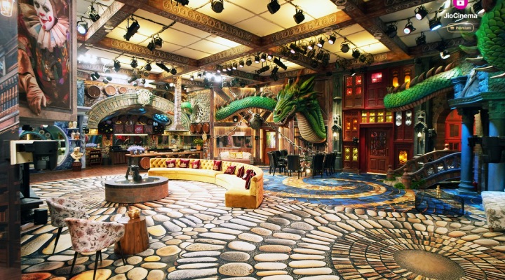 A large bridge connects the living room and storeroom, suspended over a water-printed carpet, adding a serene touch to the house.