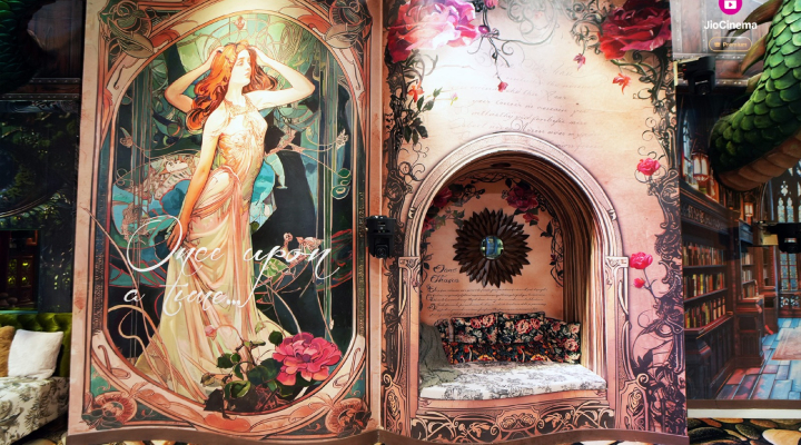 A magnificent installation is that of a giant 25ft open book in the living room, one side has the words 'Once Upon a Time' with a female figure and the other has a seating area carved into the book.