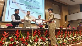 MoS for External Affairs Kirti Vardhan Singh hands over the ‘Certificate of Recognition’ to Chandigarh SSP Kanwardeep Kaur at the Regional Passport Officers Conference held at Jawaharlal Nehru Bhawan in New Delhi on Saturday. (Express Photo)