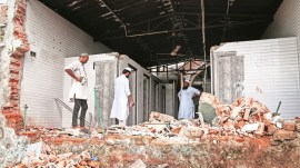 demolition_ba9947 Mangolpuri Protests, MCD demolishes mosque boundary wall, Municipal Corporation of Delhi, municipal park, women protesters, Indian express news