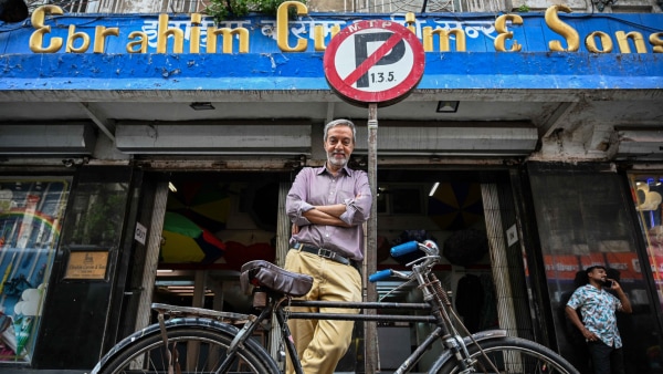 Around Town: Inside Ebrahim Currim and Sons, a 164-year-old umbrella brand in Mumbai's Kalbadevi | Mumbai News | WN24 2 Aziz Currim, the current owner of Ebrahim Currim & Sons poses for a picture in front of his shop, at Kalbadevi in Mumbai on 27 June 2024. (Express photo by Sankhadeep Banerjee)