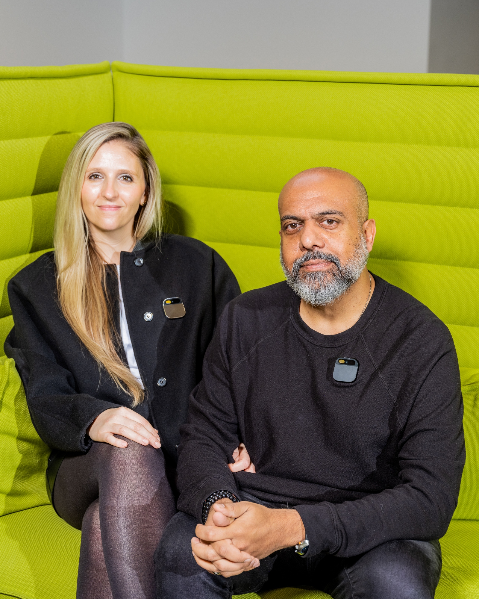 The married founders of Humane, Bethany Bongiorno, left, and Imran Chaudhri, at the company's headquarters in San Francisco on Oct.  27, 2023. The Ai Pin was supposed to free people from smartphones, but sales have been slow.  Now Humane is talking to HP and others about a potential sale.