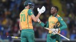 South Africa's Marco Jansen, left, and teammate Kagiso Rabada celebrate following the ICC Men's T20 World Cup cricket match between the West Indies and South Africa at Sir Vivian Richards Stadium in North Sound, Antigua and Barbuda, Sunday,