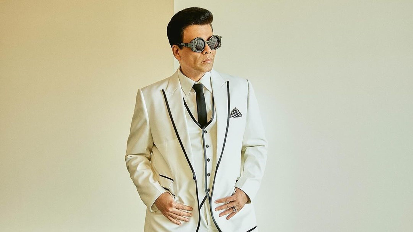 Can you guess the cost of this Hermès Birkin bag Karan Johar was seen carrying at the airport?