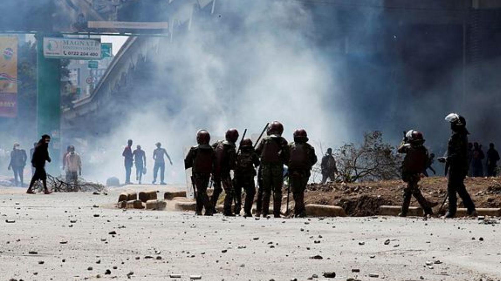 Police stand during a demonstration against Kenya's proposed finance bill 2024/2025 in Nairobi