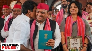 Samajwadi Party MP Akhilesh Yadav being greeted by Congress MP K C Venugopal at the Parliament House complex on the first day of the first session of the 18th Lok Sabha. (PTI)