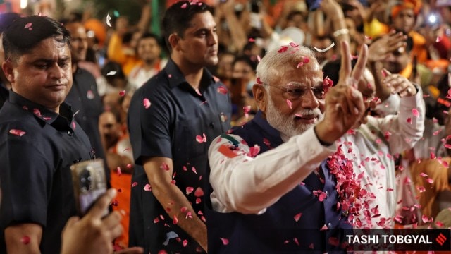 Prime Minister Narendra Modi arriving at the victory celebrations at BJP headquarters in Delhi. (Express photo by Tashi Tobgyal)