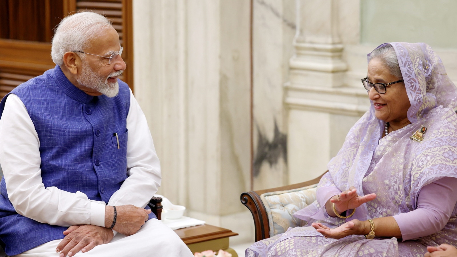 Prime Minister Narendra Modi with Bangladesh PM Sheikh Hasina during a meeting after his swearing-in ceremony. (PTI)