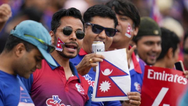 Nepal fans cheer for their team during an ICC Men's T20 World Cup cricket match between Nepal and the Netherlands at Grand Prairie Stadium in Grand Prairie, Texas