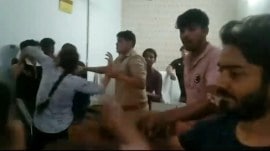 In the video, a woman can be heard saying that that instead of filing the case against the attackers, the police arrested their injured brother. (Video screengrab/ Express)