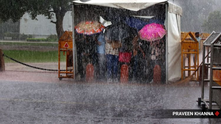 Weather News Live Updates: For the next seven days, Delhi will experience moderate to heavy rain, and an ‘orange alert’ has been issued for the next three days, the IMD said. (Express photo by Praveen Khanna)