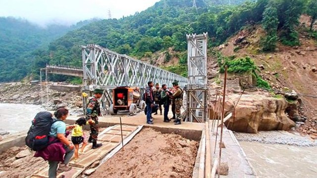 North Sikkim rain, army cuilds suspension bridge