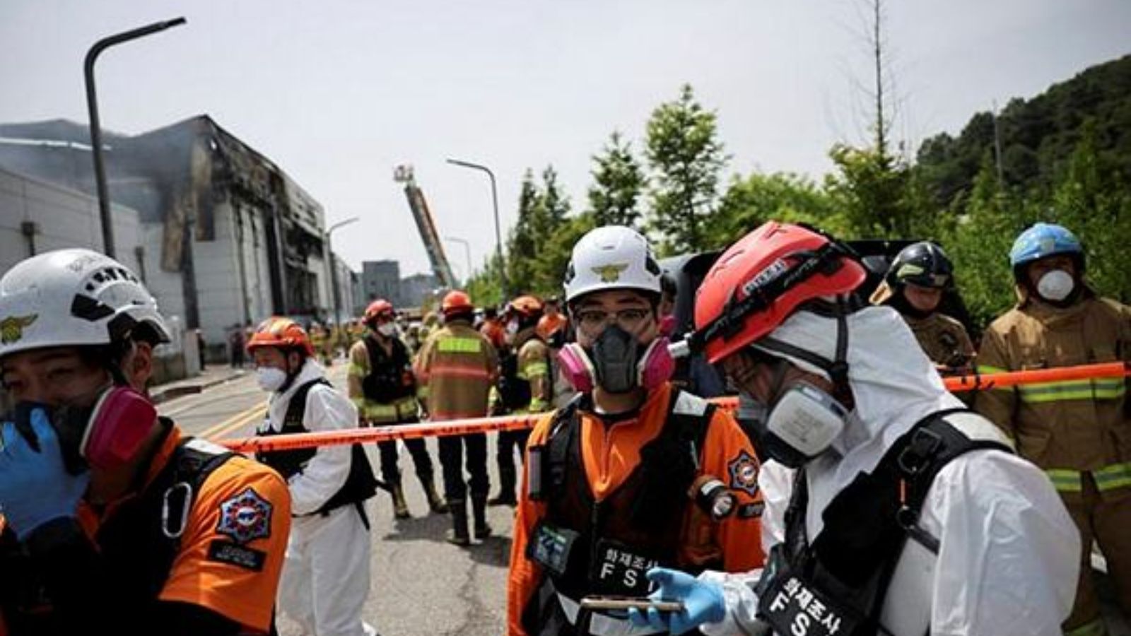 South Korean rescuers search burned factory after a blaze killed 22 ...