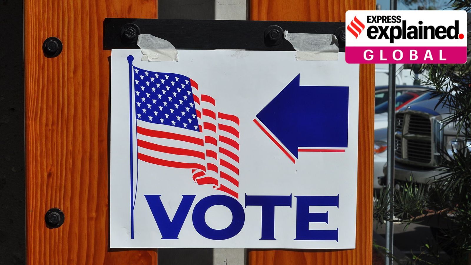 poster outside a polling booth encouraging people to vote