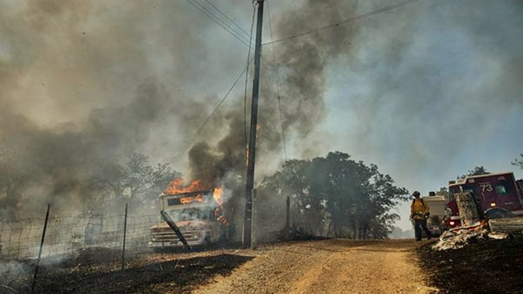 Thousands Evacuate As Northern California Wildfire Spreads With More