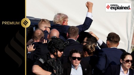 Republican presidential candidate and former U.S. President Donald Trump gets into a vehicle with the assistance of U.S. Secret Service personnel after he was shot at during a campaign rally at the Butler Farm Show in Butler, Pennsylvania, U.S., July 13, 2024.