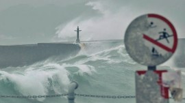 Waves break against the protecting walls as Typhoon Gaemi approaches in Keelung, Taiwan July 24, 2024. (Reuters)