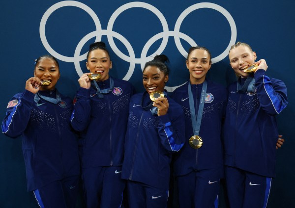 The USA gold-medal winning team comprising (L-R)  Simone Biles, Jordan Chiles, Jade Carey, Sunisa Lee and Hezly Rivera. (REUTERS)