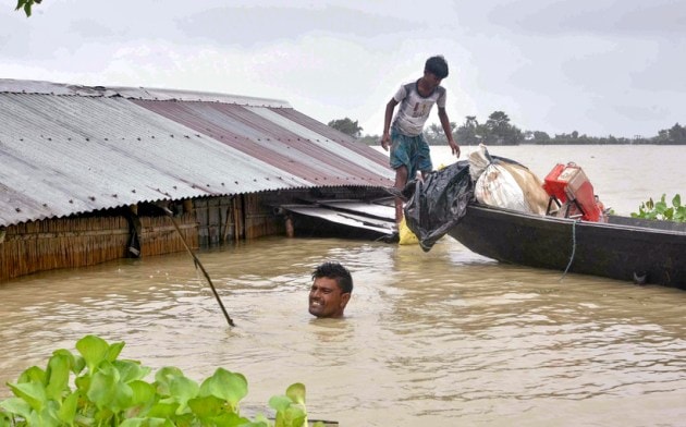 Lakhs of people displaced, animals stranded as floods, landslides ...