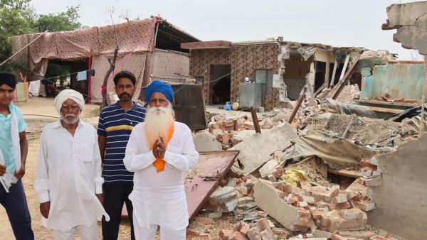 The village sarpanch, Yudhveer Singh Rana (25), says he has a copy of the Punjab and Haryana High Court's orders announced in 1994 directing eviction of Khullar's family from the 16-acre shamlat land.
