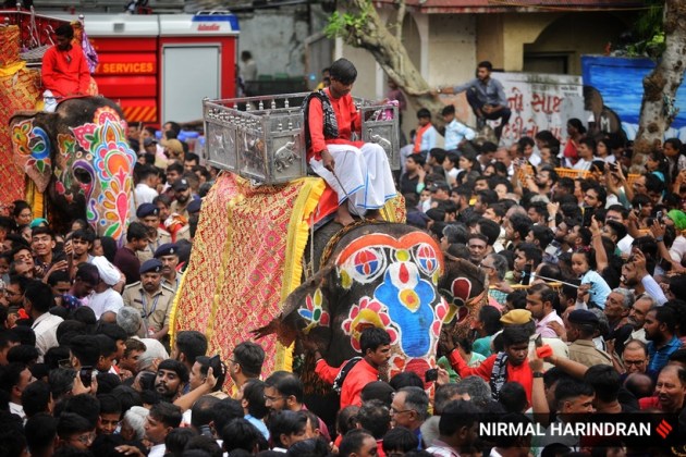 Ahmedabad, Gujarat, Lord Jagannath, Rath Yatra, devotees, security, chariots, Khalashi community, tradition, Ashadhi Beej, Hindu, temple, Jamalpur area, peaceful procession, Union Home Minister, Amit Shah, Gujarat Chief Minister, Bhupendra Patel, pahind vidhi, golden broom, medical emergencies, ambulances, GVK Emergency Management and Research Institute, 108 ambulance service, medical teams, government-run hospitals, CM Dashboard, Chief Minister's Office, security personnel, balloon-mounted cameras, traffic management, body-worn cameras, drones, surveillance cameras, CCTV cameras, decorated elephants, tableaux, akhadas (local gymnasiums), bhajan mandlis, T20 World Cup, renewable energy, Surat