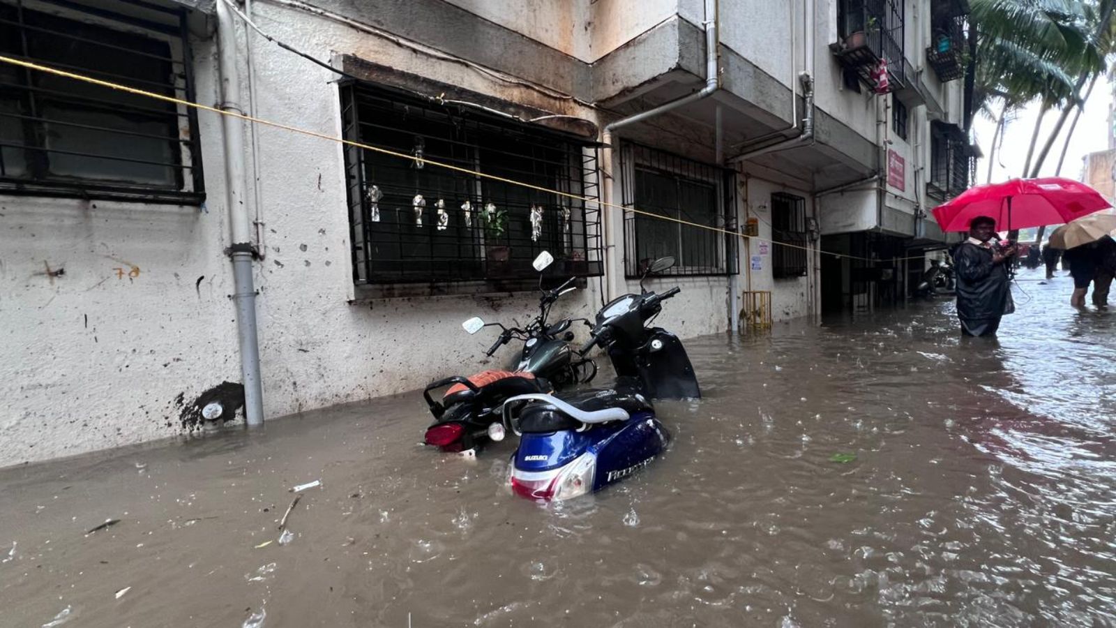 Pune rains photos: Vehicles submerged, fallen trees, and rescue boats on streets