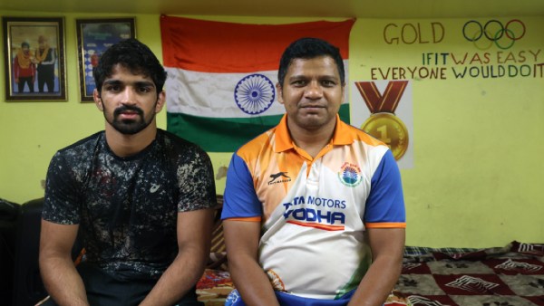 Wrestler Aman Sehrawat with coach Lalit Kumar (Express Photo by Gajendra Yadav)