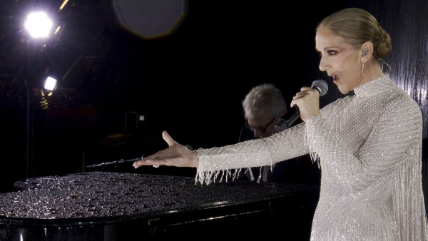 Canadian Singer Celine Dion performing at the Eiffel Tower during the opening ceremony for the 2024 Summer Olympics in Paris, France, Friday, July 26, 2024. (Olympic Broadcasting Services via AP)