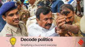 BJP MLA C K Ramamurthy being detained by police during a protest march by the BJP against alleged corruption by the ruling Congress government, in Bengaluru, on Wednesday. (PTI Photo)