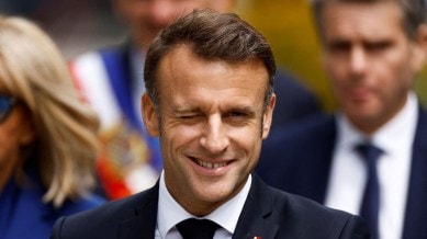 French President Macron votes in the second round of the 2024 snap legislative elections