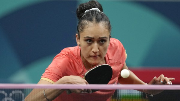 India's Manika Batra plays against Britain's Anna Hursey during a women's singles round of 64 table tennis game at the 2024 Summer Olympics