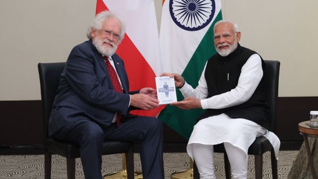 Prime Minister Narendra Modi Austria visit, Modi meets Austrian Indologists, Indian history and thought, 75 years India-Austria relations, Chancellor Karl Nehammer, Buddhist philosophy scholar Dr Birgit Kellner, Modern South Asia scholar Prof. Martin Gaenszle, South Asian studies Dr Borayin Larios, Indology Department Dr Karin Preisendanz, Ministry of External Affairs India, Indology in Austria, Nobel Laureate Anton Zeilinger,