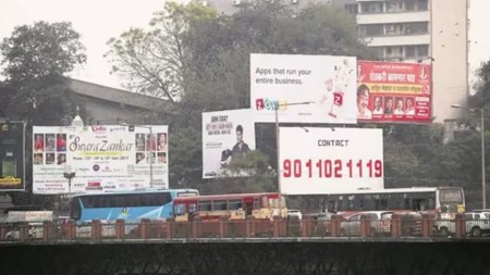 Crackdown on oversized hoardings, Mumbai oversized hoardings, oversized hoardings on railway premises, Brihanmumbai Municipal Corporation, BMC Notices, Mumbai news, Indian express news