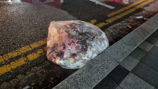 A plastic bag carrying various objects including what appeared to be trash that crossed inter-Korean border with a balloon believed to have been sent by North Korea, is pictured in Seoul
