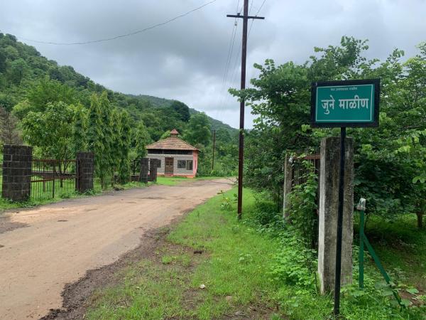 A board pointing to Old Malin. In 2017, the landslide survivors were rehabilitated in New Malin, which is 1 km away from Old Malin. Ravina Warkad