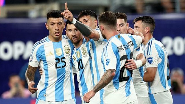 Lionel Messi celebrates his goal with his Argentina teammates. (Reuters)